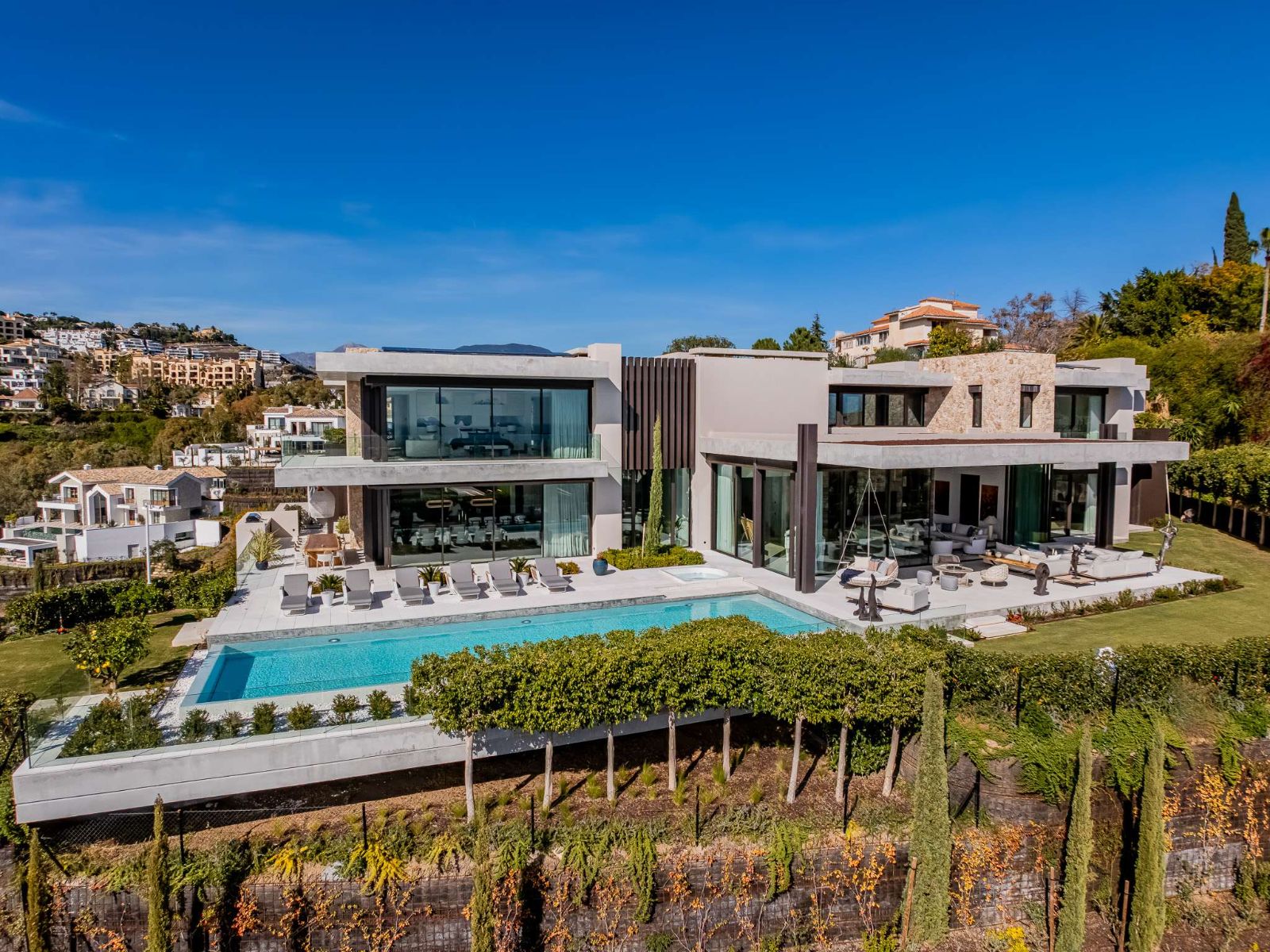 Aerial rear view of The Hills Nº 12 villa, pool and landscaped garden